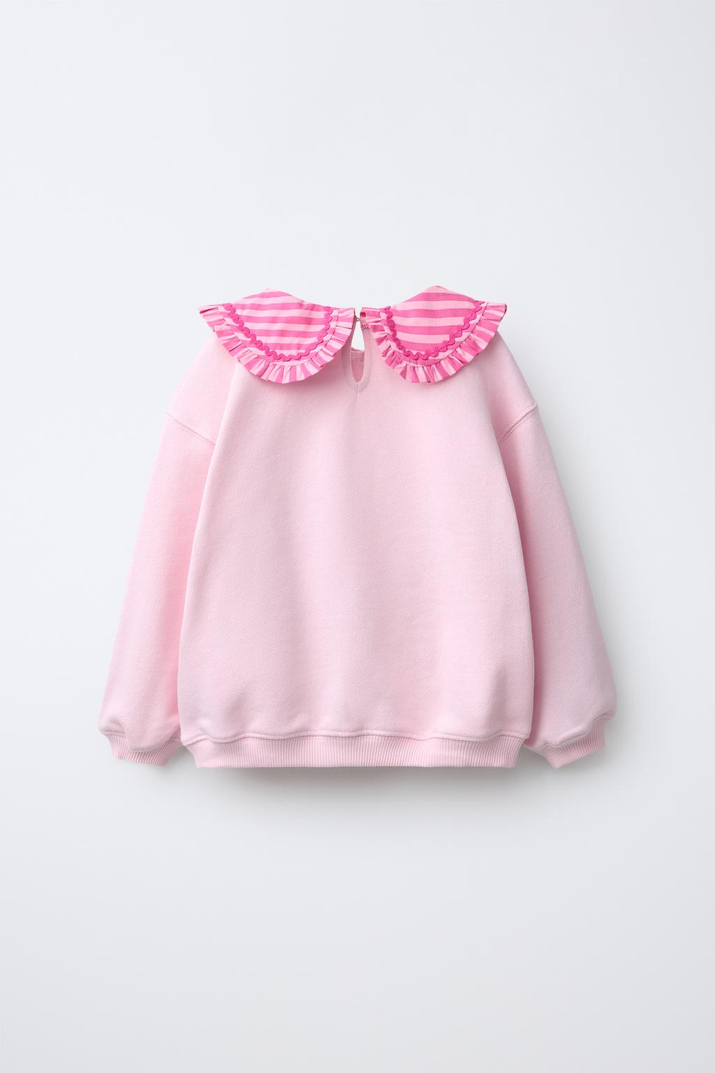 ТОЛСТОВКА С ВОРОТНИКОМ-ХОМУТОМ И ВОЛНИСТЫМ УЗОРОМ