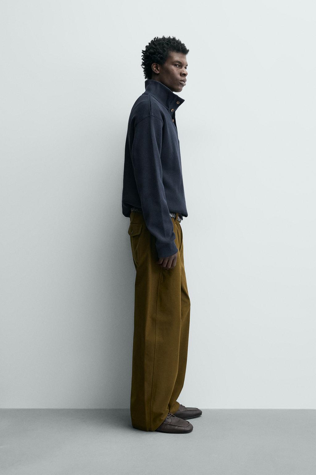 ТОЛСТОВКА ИЗ РЕЛЬЕФНОГО ТРИКОТАЖА В РУБЧИК