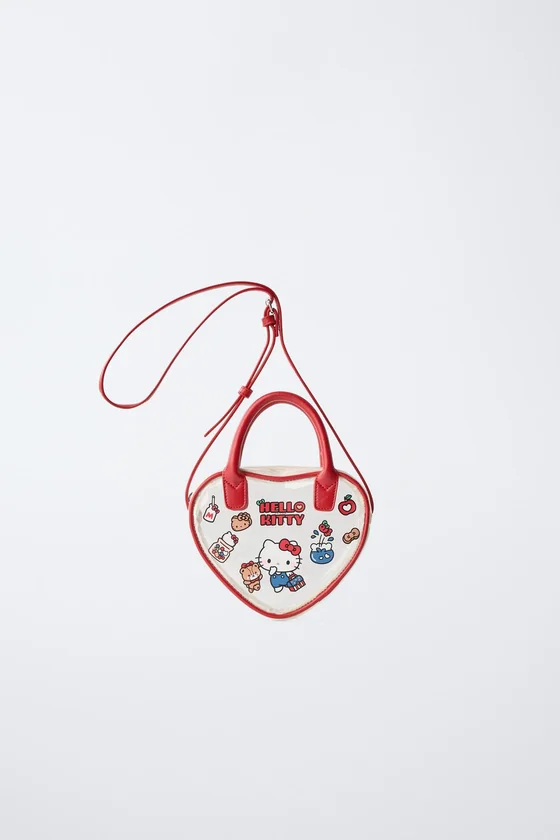 СУМКА С ПЛЕЧЕВЫМ РЕМНЕМ В ФОРМЕ СЕРДЦА HELLO KITTY © SANRIO