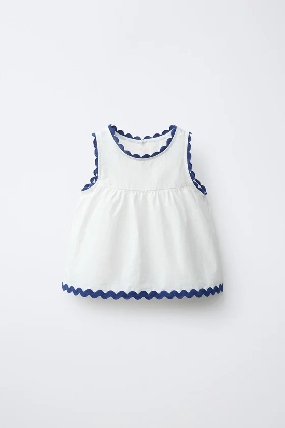 ТОП ИЗ ПОПЛИНА С ВОЛНИСТЫМ КОНТРАСТНЫМ КРАЕМ CASA LAWA X ZARA KIDS