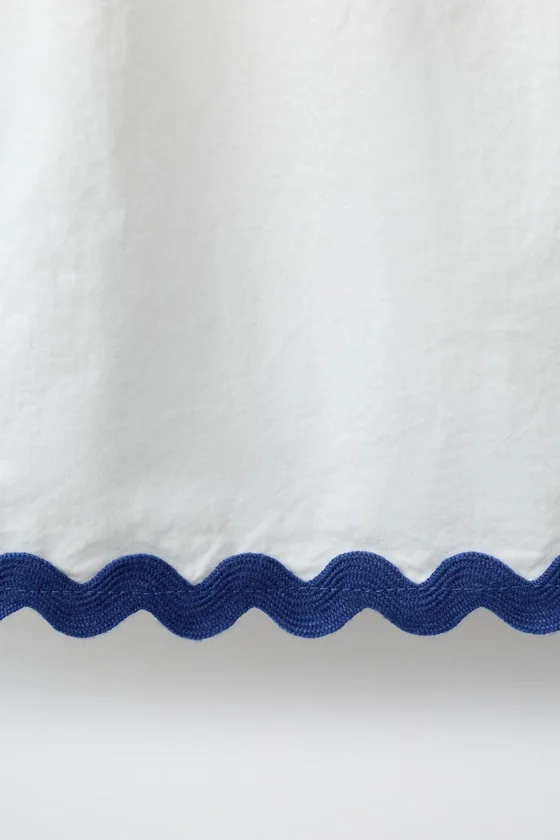 ТОП ИЗ ПОПЛИНА С ВОЛНИСТЫМ КОНТРАСТНЫМ КРАЕМ CASA LAWA X ZARA KIDS