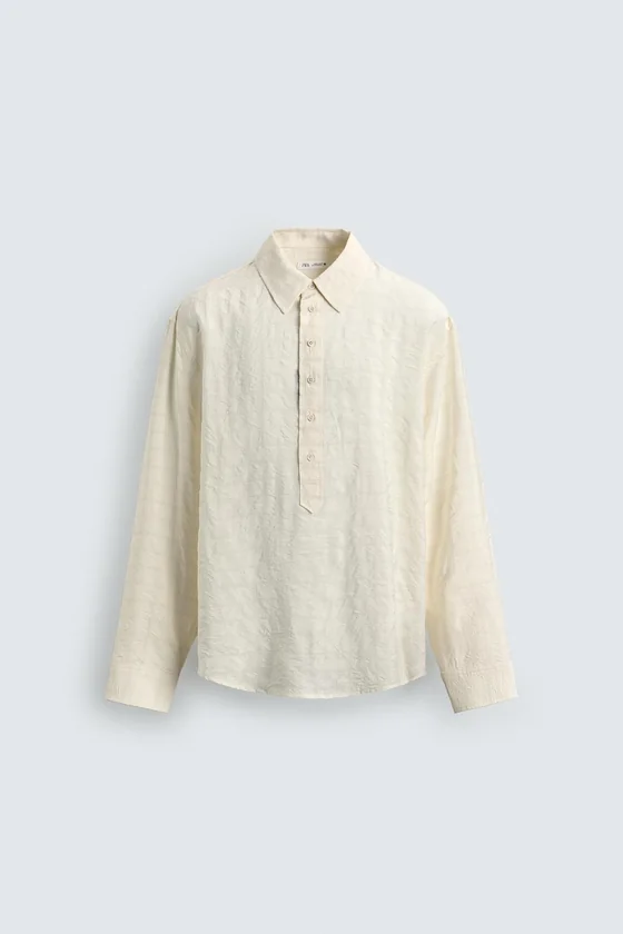 ПОЛО JACQUARD В КЛЕТКУ С ЖАТЫМ ЭФФЕКТОМ